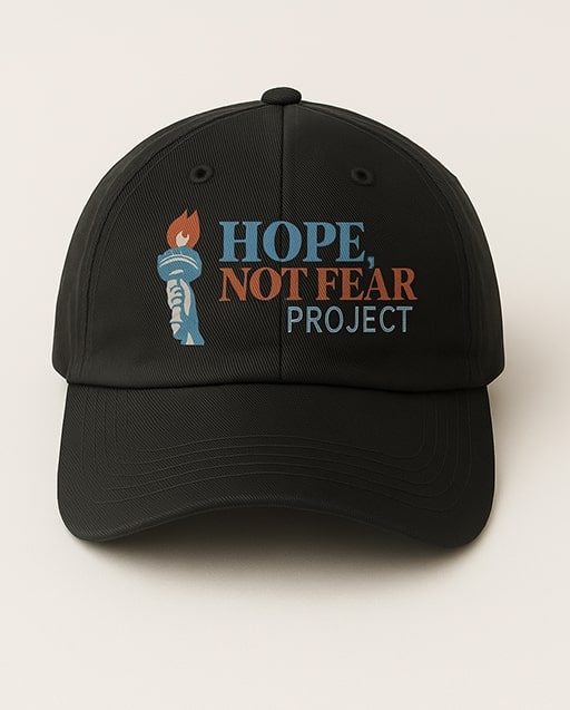 Sky blue cap concept with circular Hope, Not Fear badge logo.