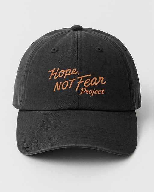 Black dad hat concept with subtle Hope Not Fear script embroidery.
